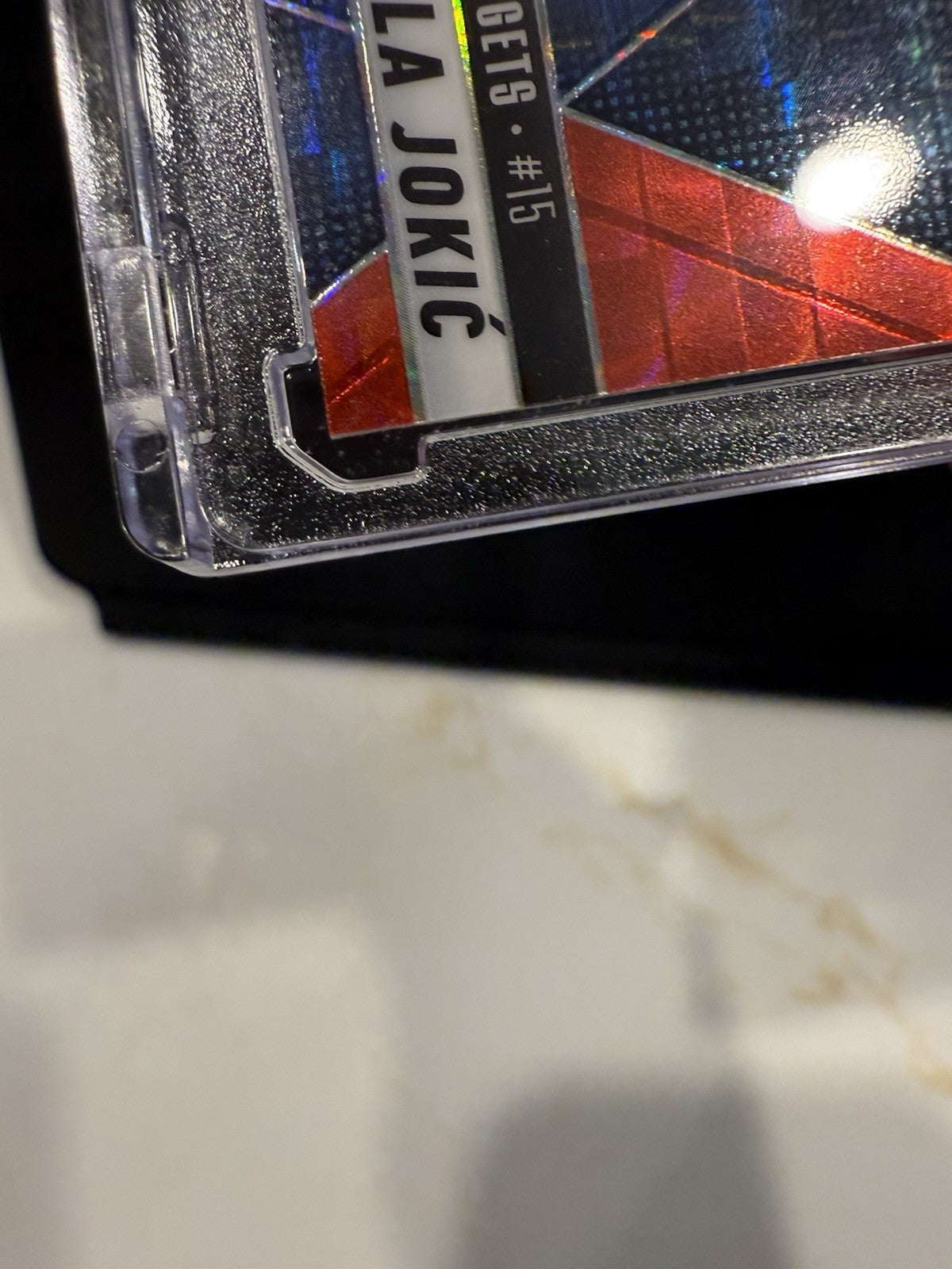 2024-25 Panini Mosaic Mosaic Red #117 Nikola Jokic NUGGETS