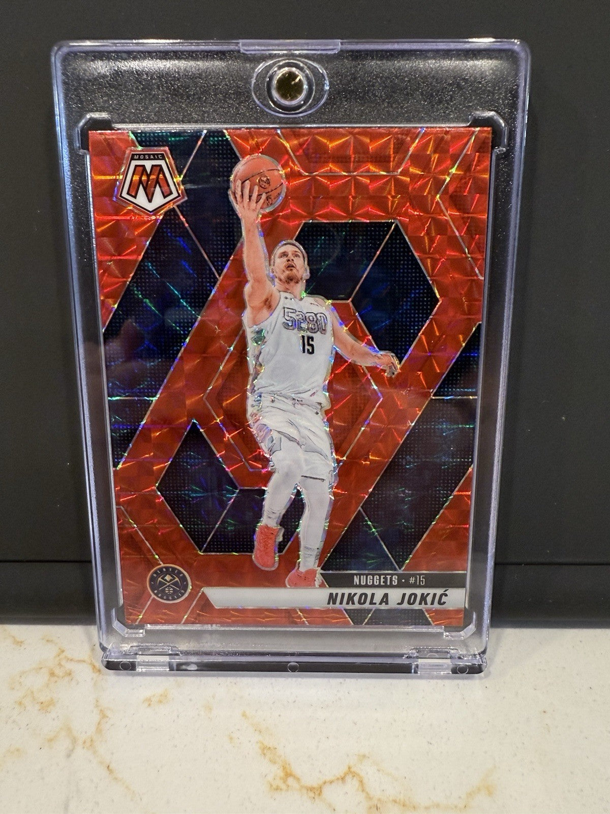 2024-25 Panini Mosaic Mosaic Red #117 Nikola Jokic NUGGETS